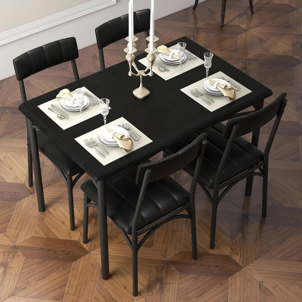 Set da pranzo con tavolo rettangolare per 4 persone e sedie imbottite
