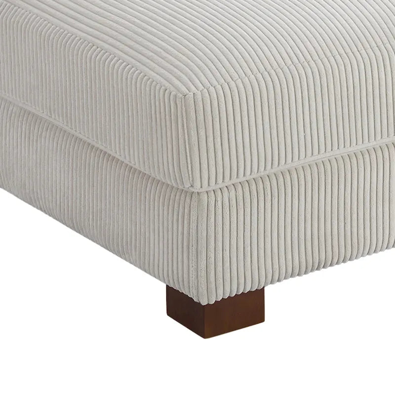 Grand pouf décoratif moderne en velours côtelé