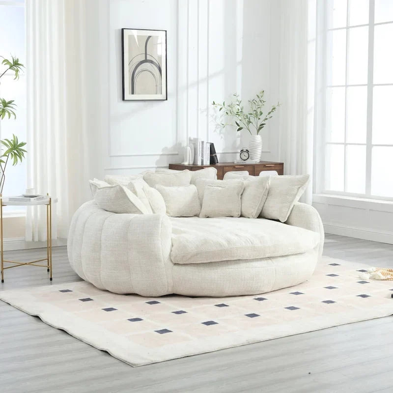 Comodo divano letto matrimoniale a forma di pagnotta, formato extra-large con braccioli