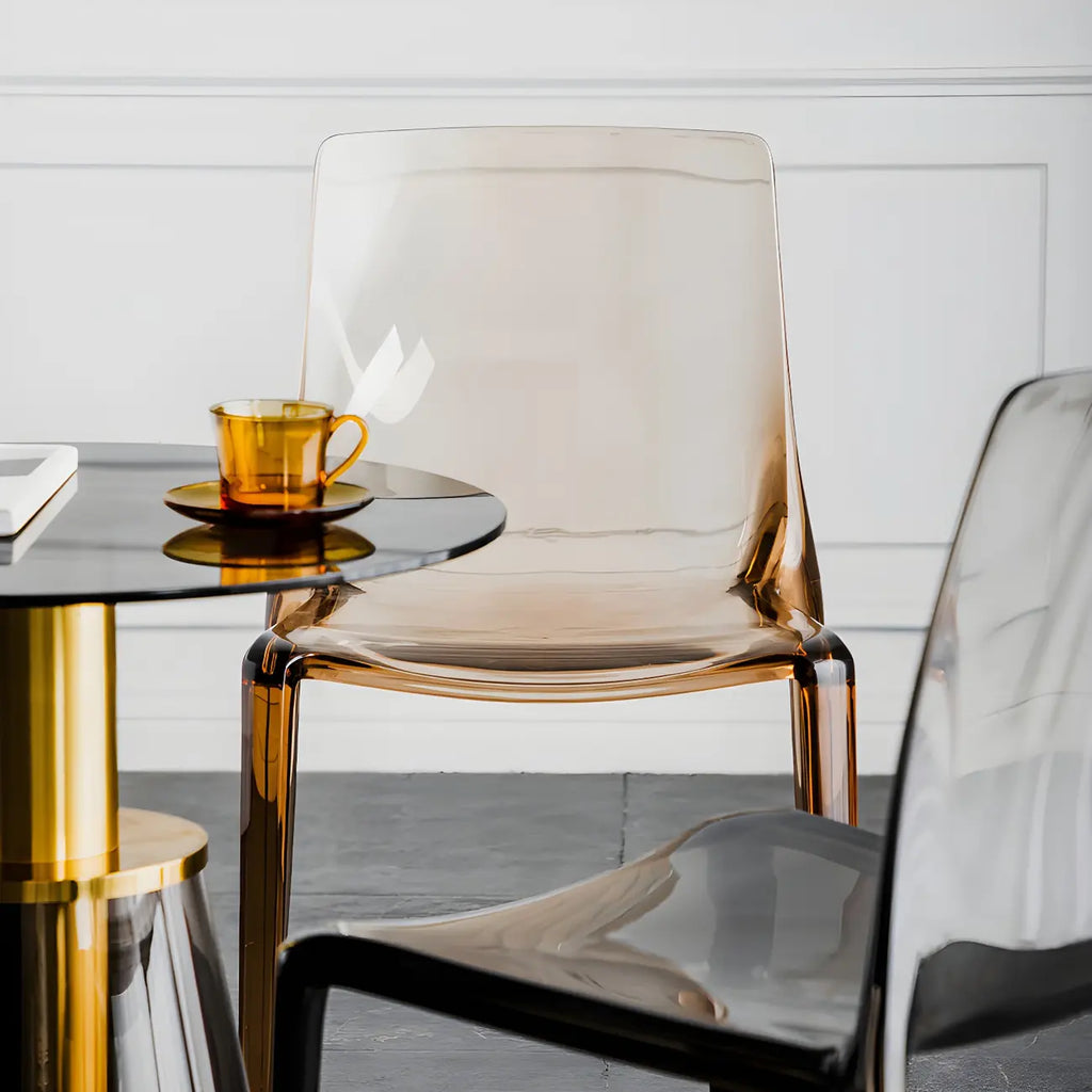 Chaise de salle à manger ambre en acrylique, sans accoudoirs et à dossier bas