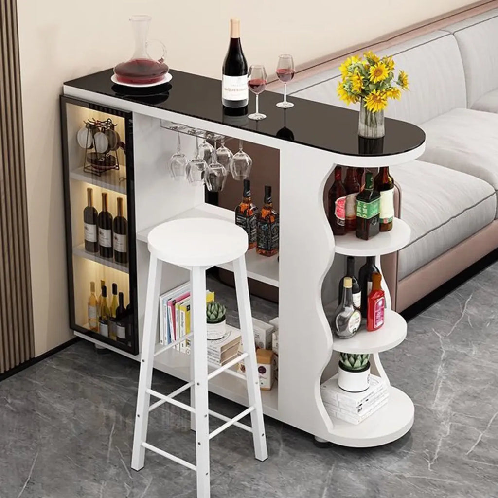 Tavolo da bar moderno dalla forma irregolare con piano in pietra e spazio contenitore per bar domestici