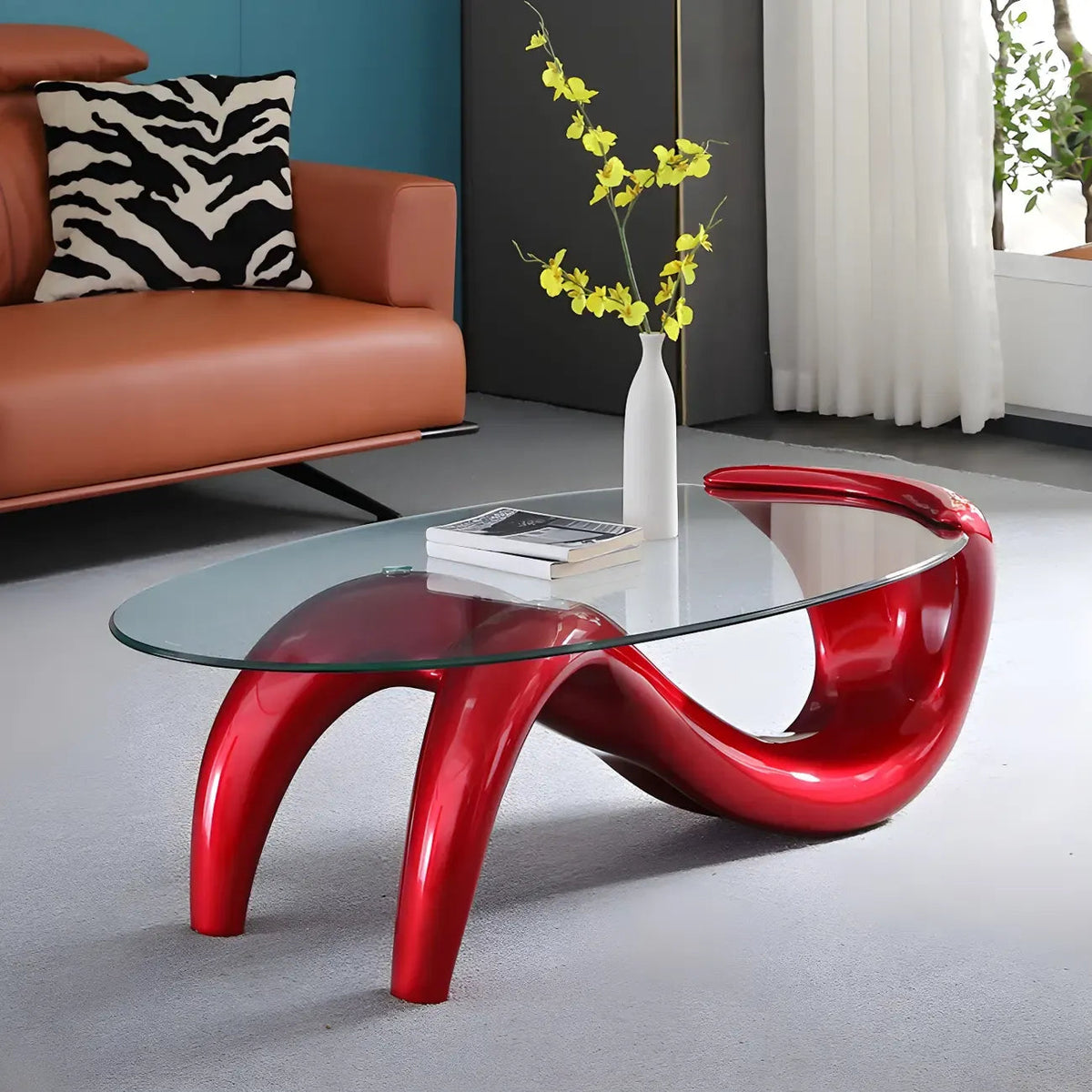 Moderner ovaler Couchtisch mit Glasplatte und Metallgestell im abstrakten Design