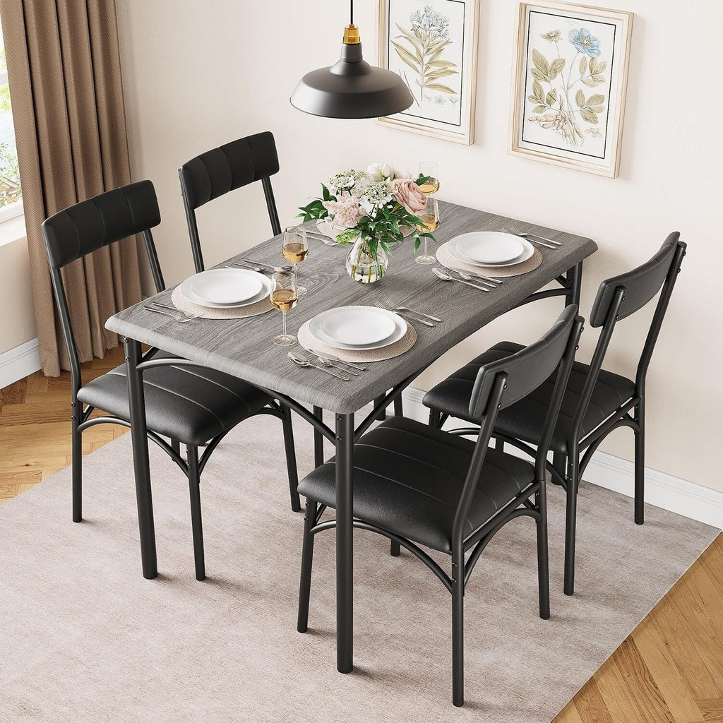 Set da pranzo con tavolo rettangolare per 4 persone e sedie imbottite
