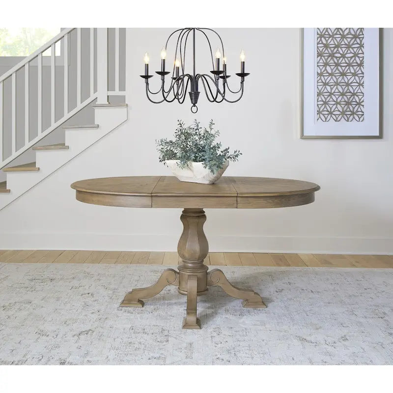 Tavolo da pranzo rotondo Magnolia Manor con base a colonna e prolunghe - 2 finiture