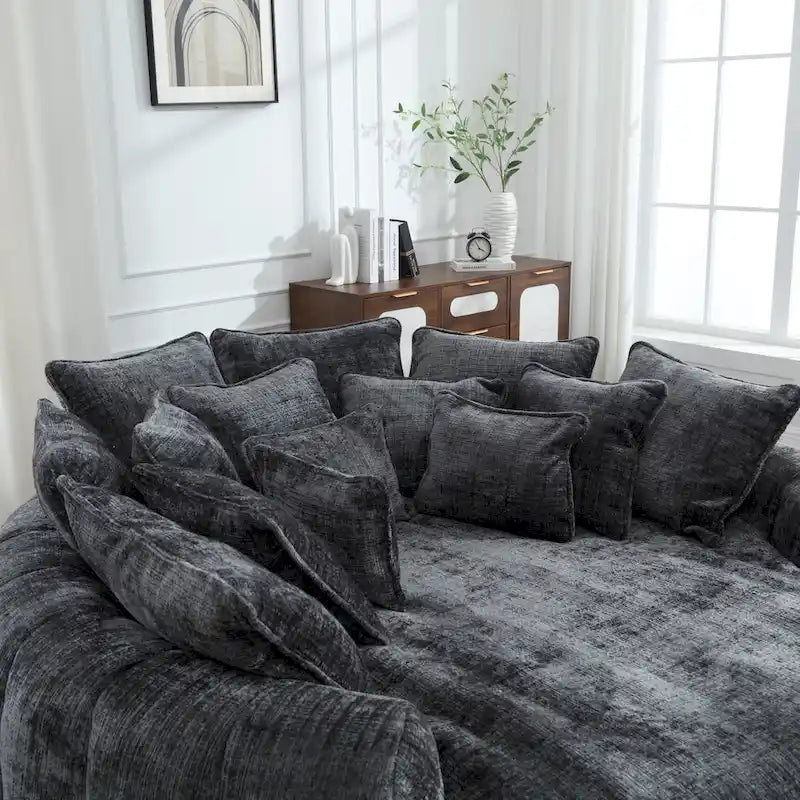 Comodo divano letto matrimoniale a forma di pagnotta, formato extra-large con braccioli