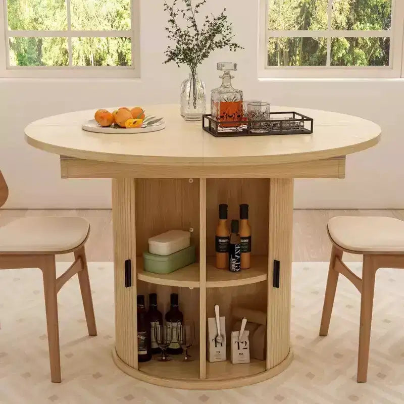 Tavolo da cucina e sala da pranzo rotondo allungabile Dyonery 63, con ripiano contenitore a 2 livelli e base a piedistallo, mobile da pranzo in legno ovale e circolare, noce