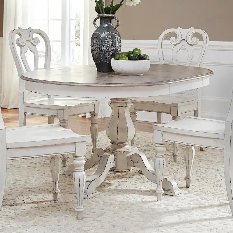Tavolo da pranzo rotondo Magnolia Manor con base a colonna e prolunghe - 2 finiture